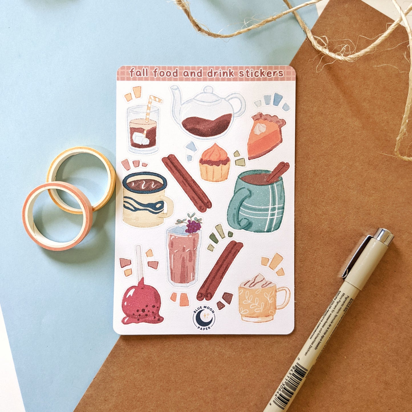Sticker sheet featuring illustrations of fall themed food and drinks such as tea, candy apples, and hot chocolate.