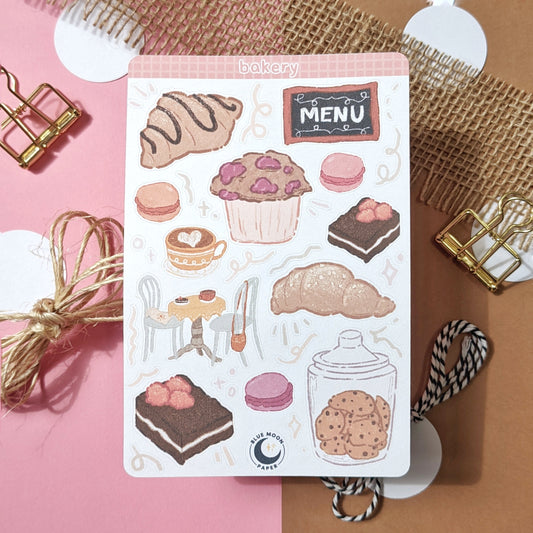 Sticker sheet with illustrations such as croissants, muffins, and cookies.