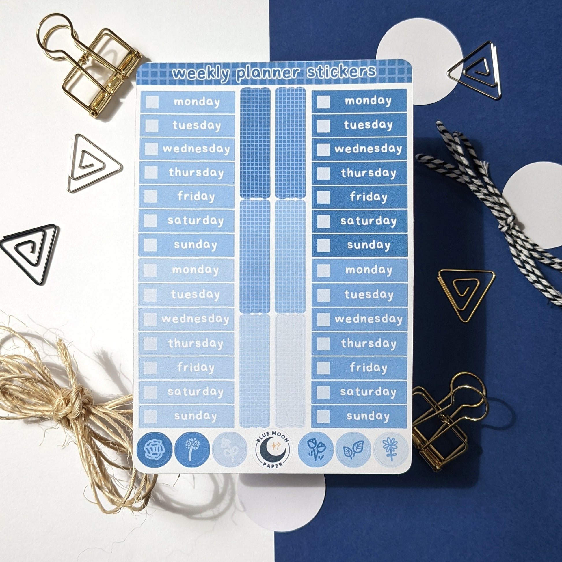 Blue sticker sheet with the days of the week on it, rectangles, and dots with floral illustrations.