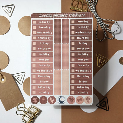 Brown sticker sheet with the days of the week on it, rectangles, and dots with floral illustrations.